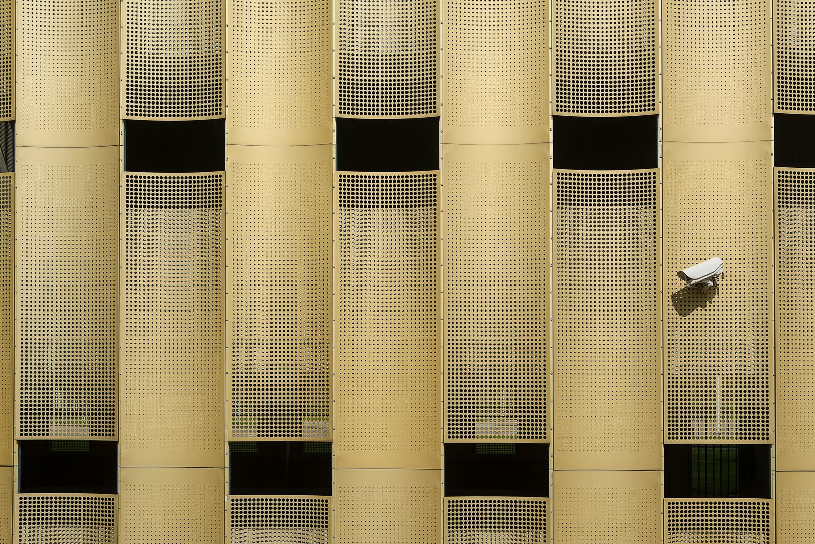 Security camera mounted on the exterior of a building